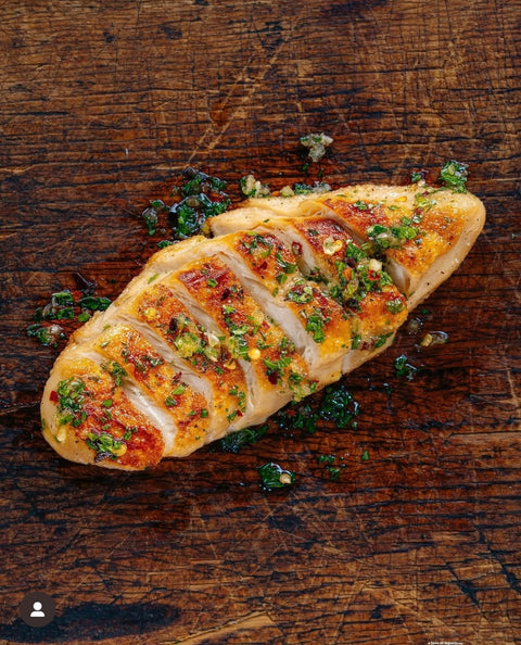 A piece of Swap vegan chicken on a cutting board